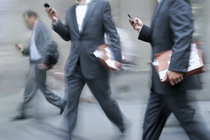 business-men-cell-phone-walking